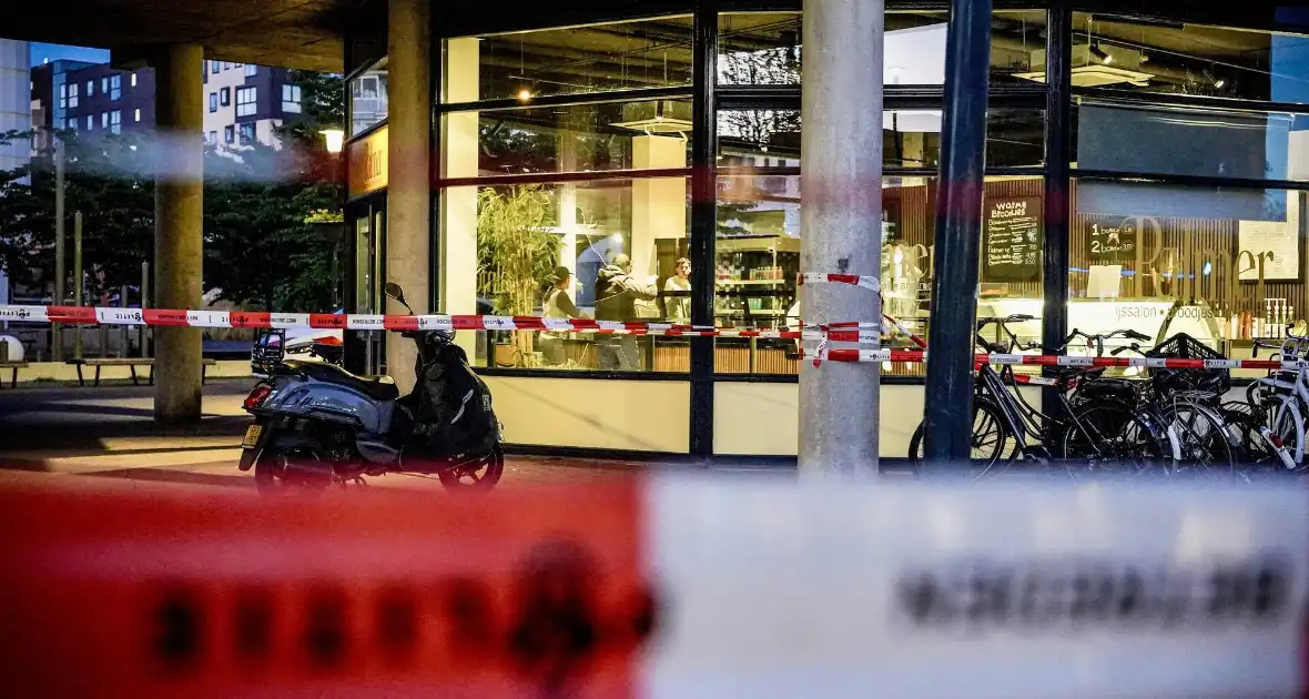 Winkel beschadigd bij schietpartij - Foto 2