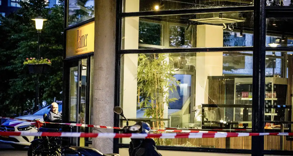 Winkel beschadigd bij schietpartij - Foto 7