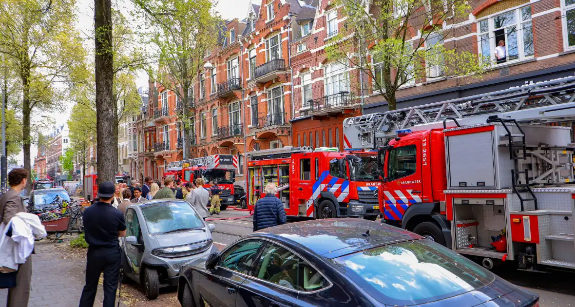 Brand in kledingwinkel snel onder controle - Foto 5