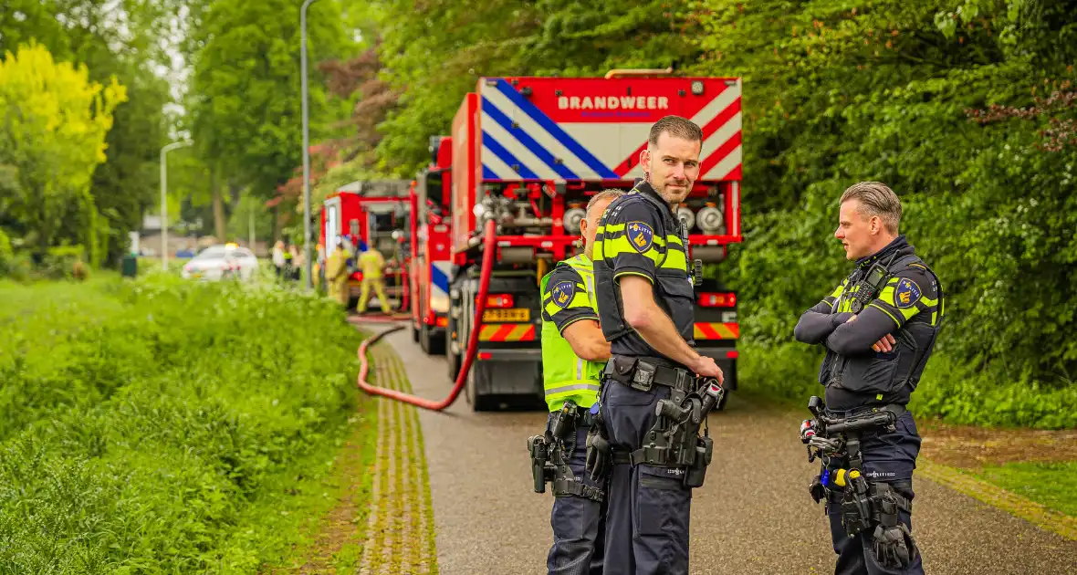 Brand in woning zorgt voor grote brandweerinzet - Foto 2