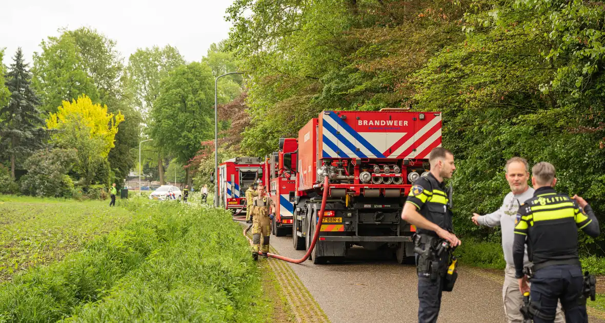 Brand in woning zorgt voor grote brandweerinzet - Foto 4