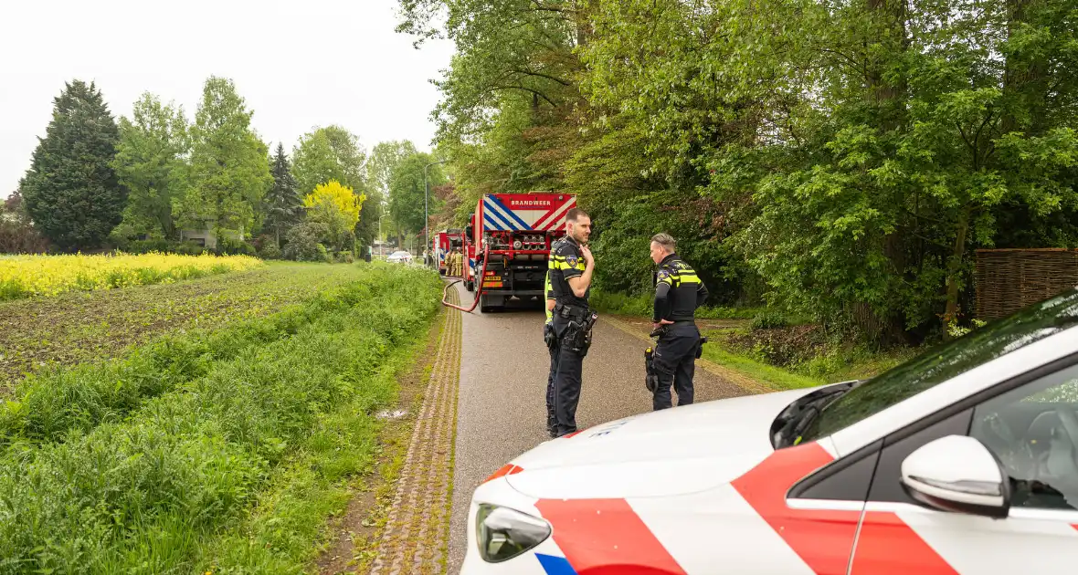 Brand in woning zorgt voor grote brandweerinzet - Foto 5