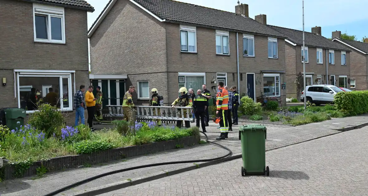 Brand op dak woning door werkzaamheden - Foto 1