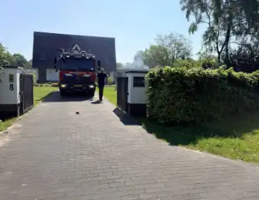 Buitenbrand in heg snel geblust