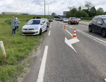 Kopstaart aanrijding met drie voertuigen