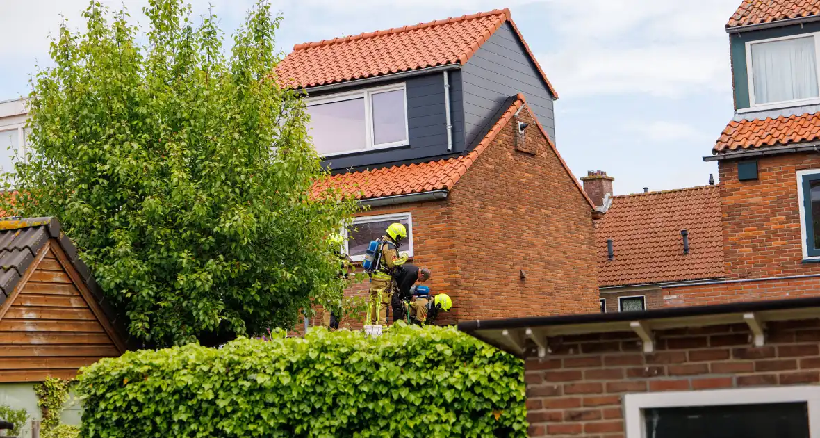 Brand op dak tijdens verbouwing - Foto 5