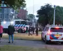 Waterwerper ingezet en veiligheidsrisicogebied na rellen