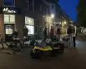 Scooterrijders ten val na botsing