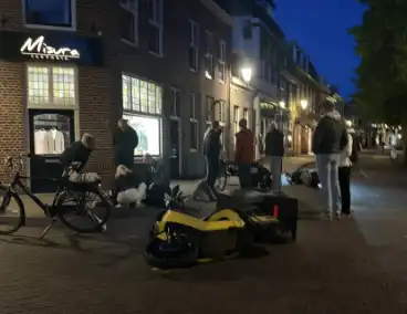 Scooterrijders ten val na botsing