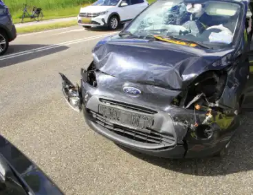 Kopstaartbotsing bij verkeerslichten met kinderen betrokken