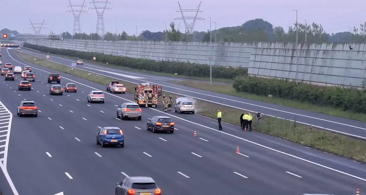 Brand in voertuig op snelweg