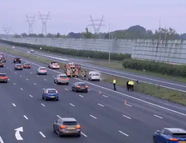 Brand in voertuig op snelweg