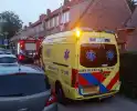 Man vast met arm in radiator