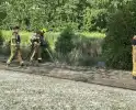 Brandweerinzet na brand in berm