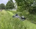 Voertuig te water na botsing