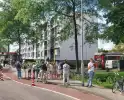Brand in portiekwoning zorgt voor snelle inzet brandweer