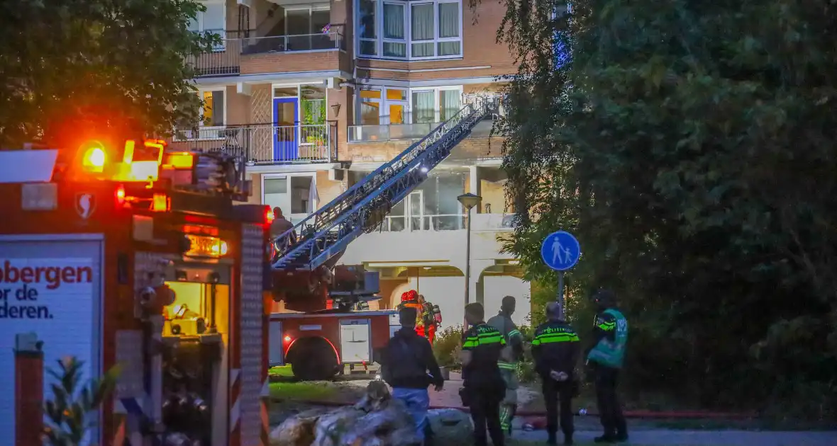 Brand in appartement leidt tot ontruiming van flatgebouw - Foto 4