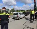 Botsing tussen auto en brommobiel