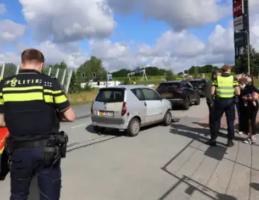 Botsing tussen auto en brommobiel