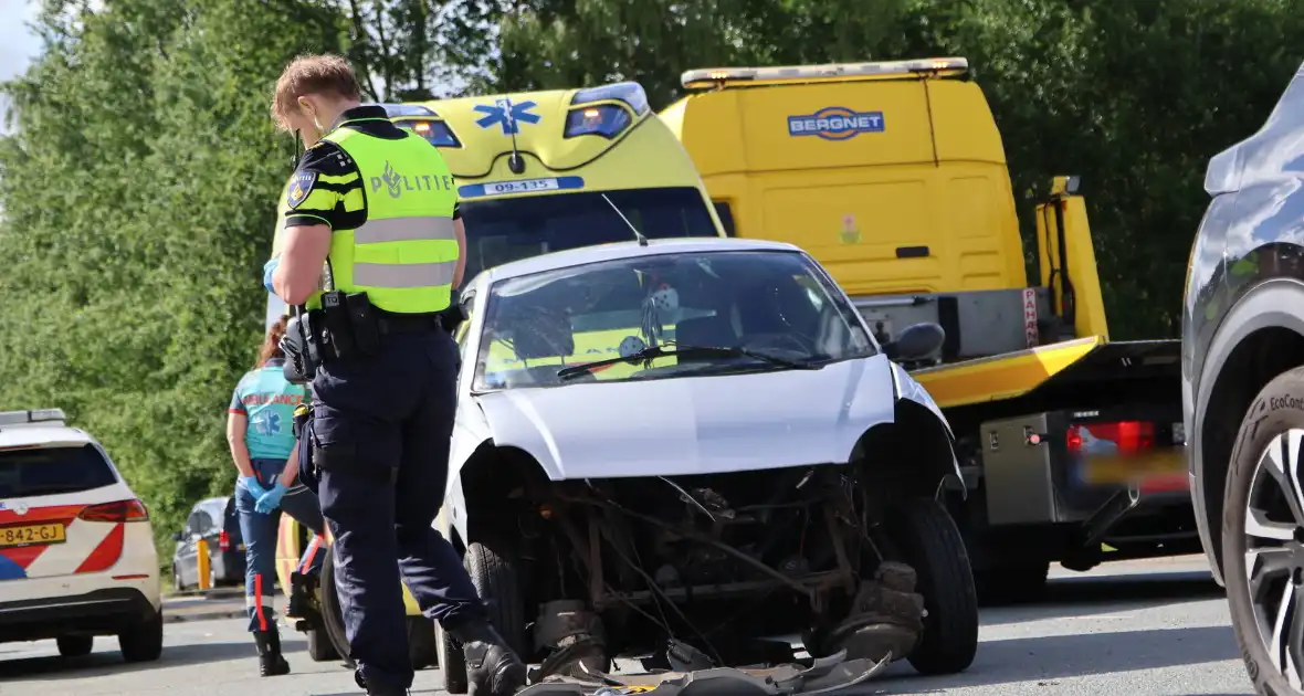 Botsing tussen auto en brommobiel - Foto 12