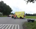 Scooterrijder in botsing met personenauto op kruising
