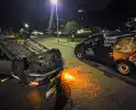 Aanhouding na botsing, auto op op zijn kop