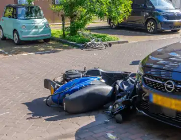 Fietser gewond bij aanrijding met motorscooter