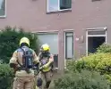 Brandweer blust woningbrand in Velp