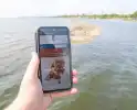 Verkoeling zoeken aan het water tijdens code rood