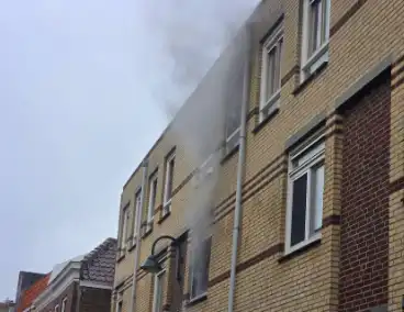 Brand in woning leidt tot rookontwikkeling