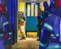 Explosief beschadigt entree woongebouw