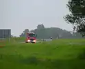 Automobilist rijdt rechtdoor in bocht