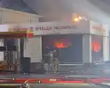 Zeer grote brand in kringloopwinkel verwoest panden