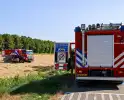 Brandweer blust berm- en struikbrand