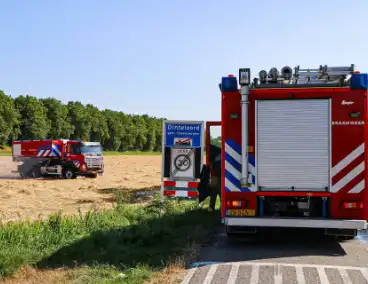 Brandweer blust berm- en struikbrand