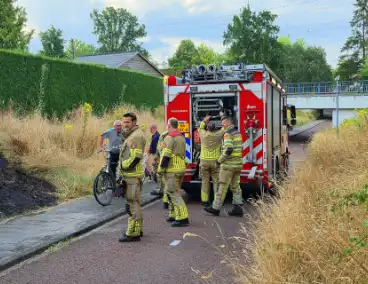 Stuk berm afgebrand naast fietspad