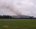 Brand bij afvalverwerkingsbedrijf in verre omtrek zichtbaar
