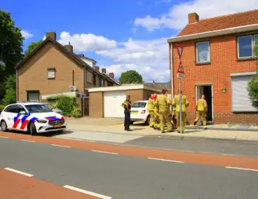 Brand in woning leidt tot ziekenhuisopname moeder en kind