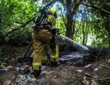 Buitenbrand in bosjes geblust