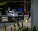 Auto op zijn kop na botsing