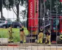 Brandweer koelt heimachine na brandmelding