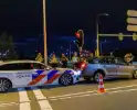 Personenauto klemgereden op afrit na achtervolging