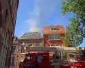 Brandweer met meerdere eenheden in actie bij brand