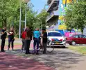 Auto en fietser botsen tijdens verkeersincident