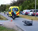 Afslaande fietser gewond bij botsing met scooterrijder