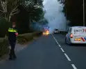 Glazenwassersbusje gaat in vlammen op