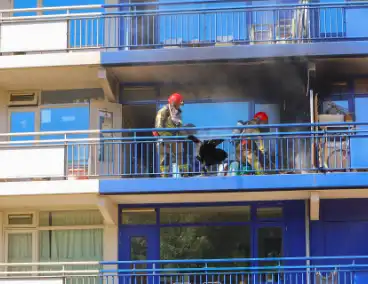 Brand in flat beperkt tot balkon
