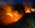 Brand in berm langs snelweg