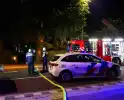 Brandweer bestrijdt vuur in bijgebouw