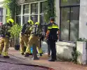 Deur geforceerd om brand in vaatwasser te bereiken